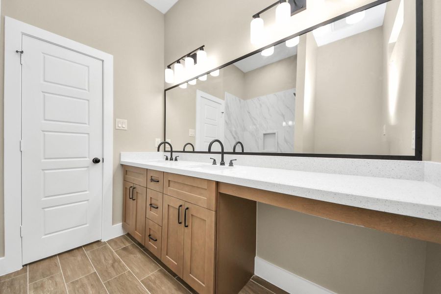 second bathroom with built in vanity
