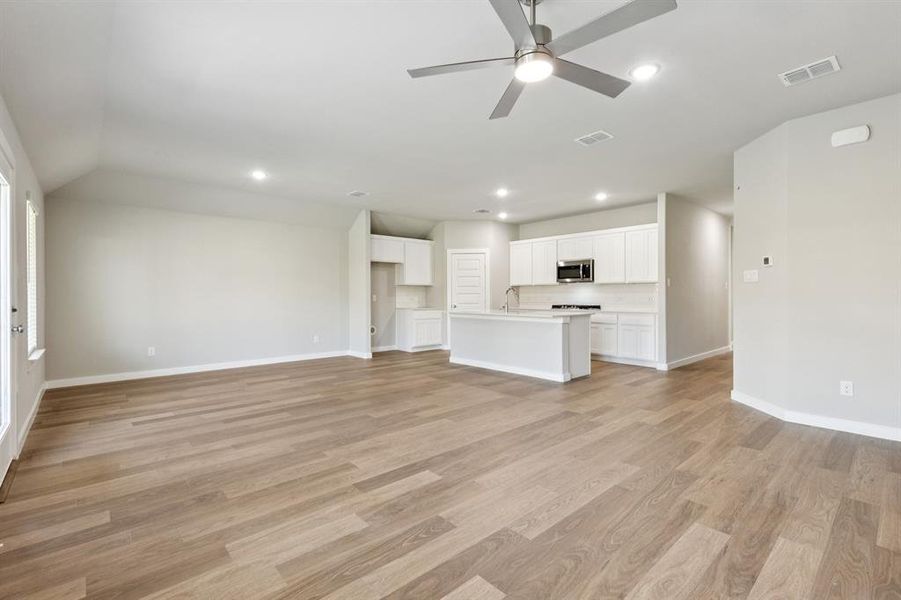 Open Floor Plan in the Emmy II home plan by Trophy Signature Homes - REPRESENTATIVE PHOTO Open Floor Plan in the Emmy II home plan by Trophy Signature Homes - REPRESENTATIVE PHOTO