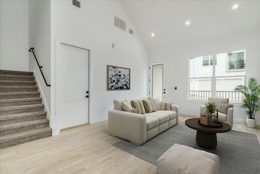 Open living with cathedral ceilings.