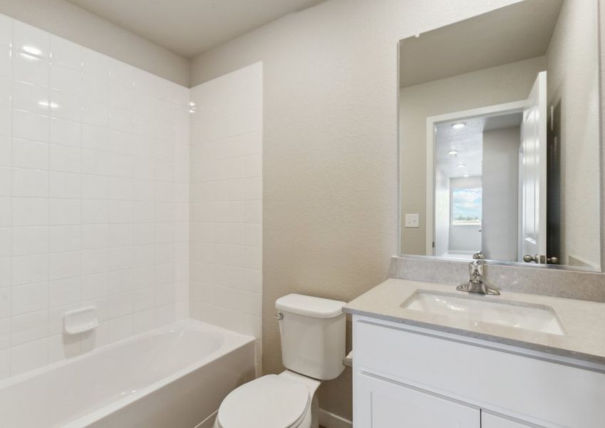 The secondary bathroom has a tub/shower combo.