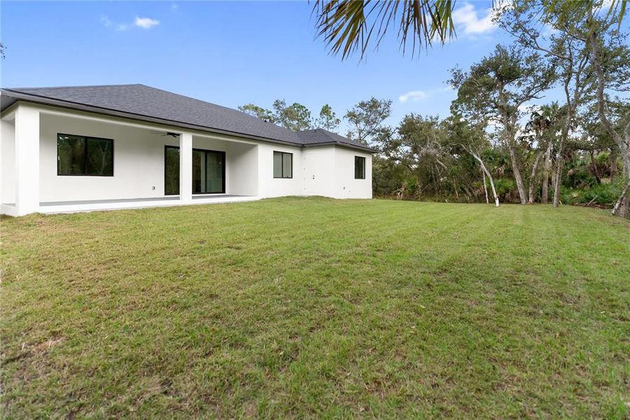 Exterior details and patio area of a home in , Port Charlotte (Image 40).