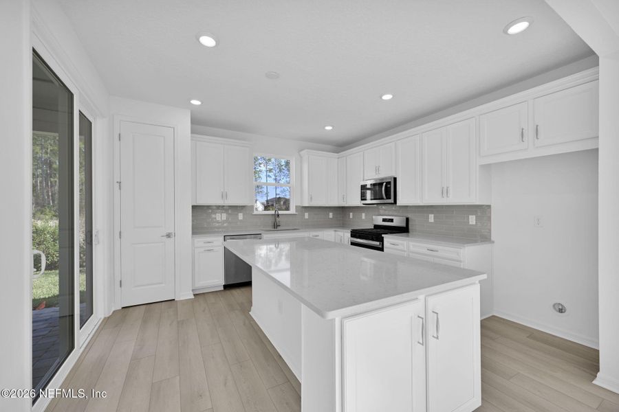 Furnished interior view inside a new home in Del Webb Wildlight, Yulee (Image 13).