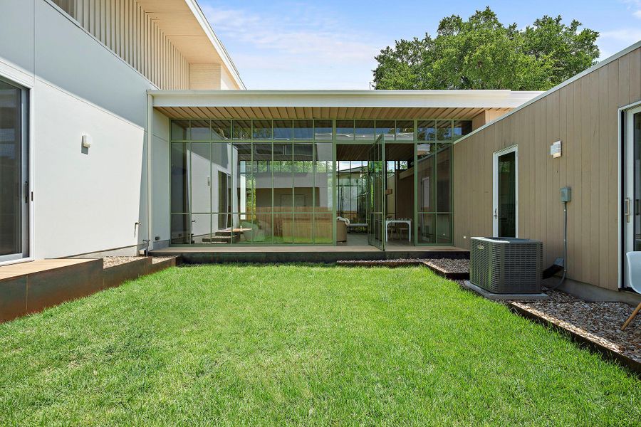 Exterior details and patio area of a home in , Austin (Image 30). Exterior details and patio area of a home in , Austin (Image 30).