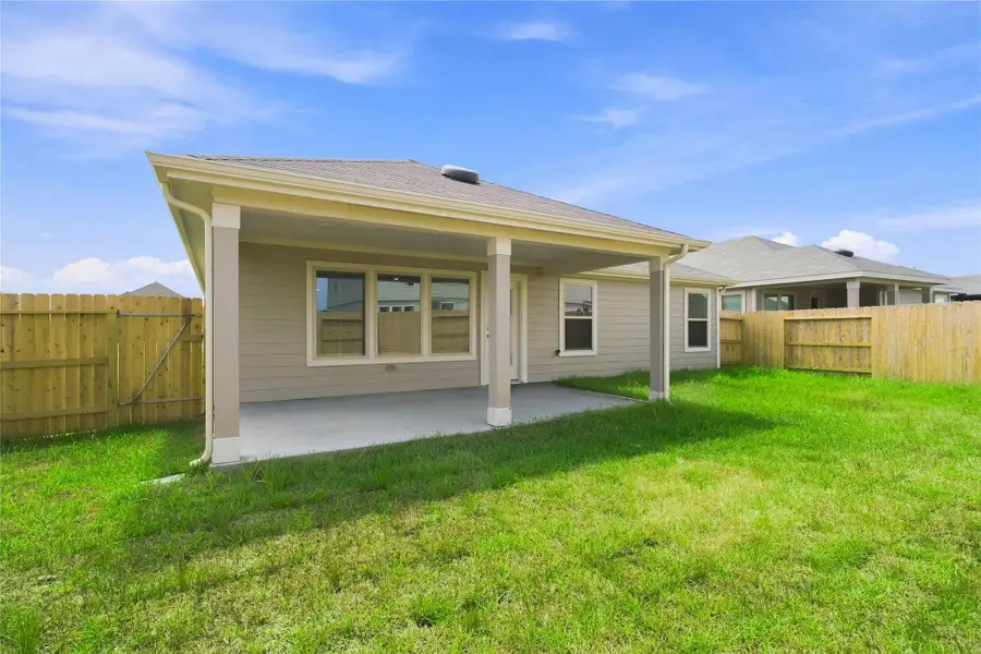 Come explore this generous backyard on a corner lot with a covered patio and fully fenced for added privacy. A wonderful spot—perfect for kids to play freely and adults to unwind in comfort!