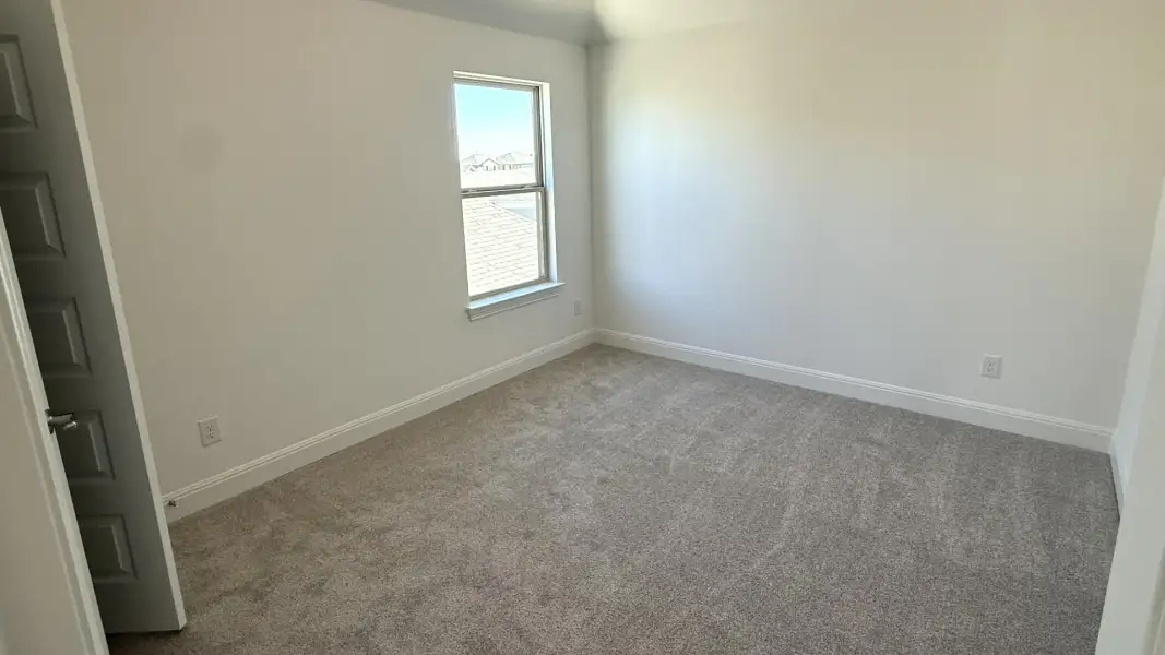 Furnished interior view inside a new home in Flora, Hutto (Image 14).