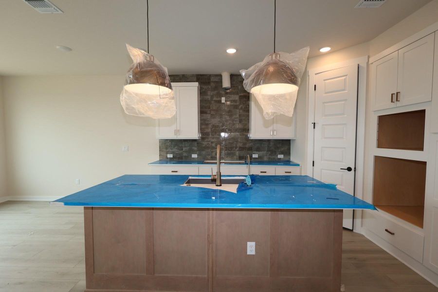 Furnished interior view inside a new home in Terrace Collection At Turner's Crossing, Buda (Image 4).
