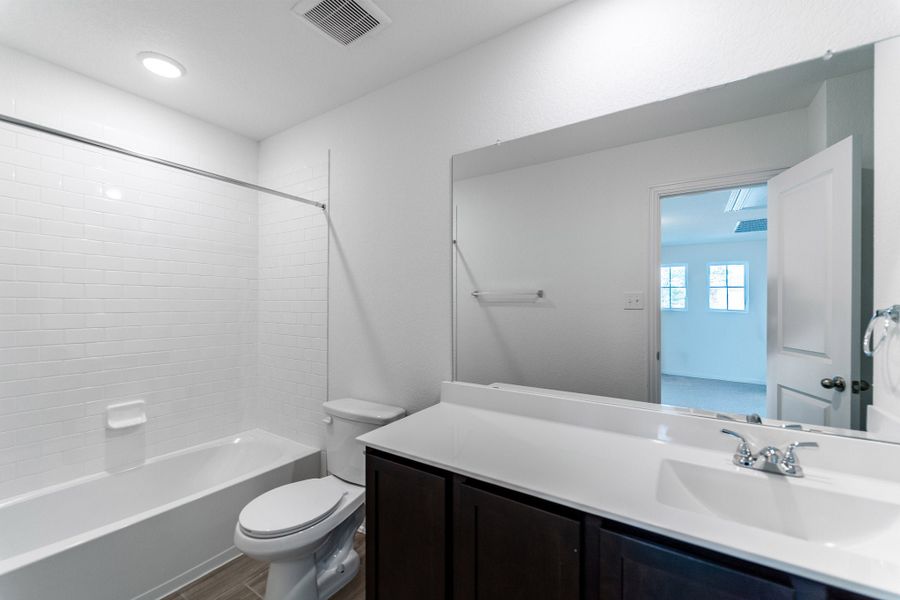 Furnished interior view inside a new home in Hunter's Ranch, San Antonio (Image 8).