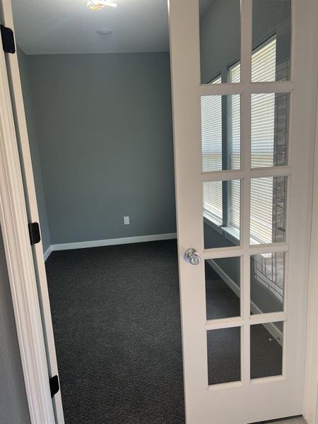 Carpeted flooring and baseboards. Carpeted flooring and baseboards.