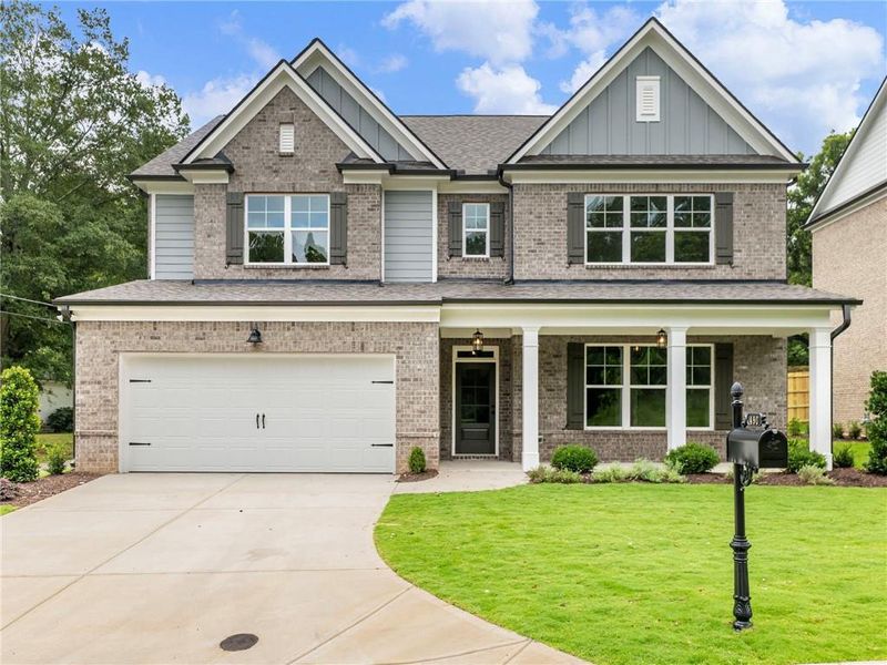 Front exterior of a new home in , Buford, GA, highlighting curb appeal (Image 20). Front exterior of a new home in , Buford, GA, highlighting curb appeal (Image 20).