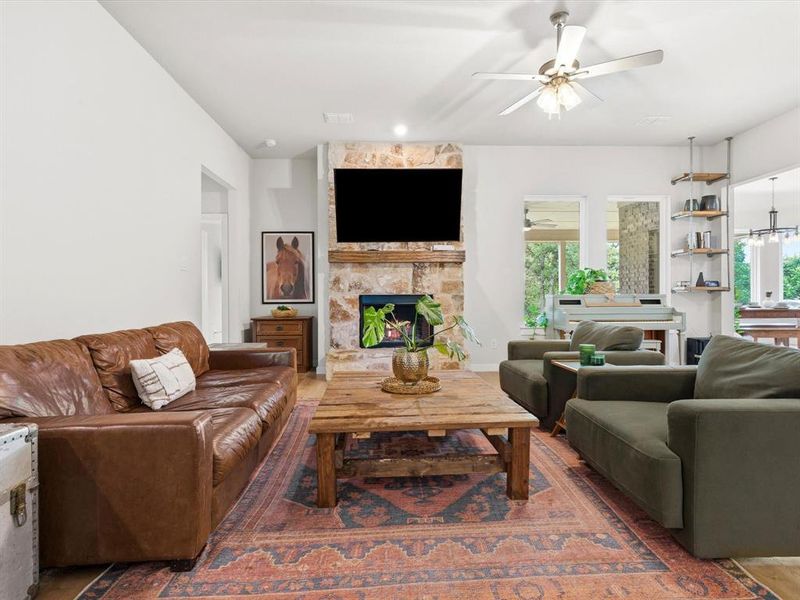 Open-concept living room with abundant natural light, ideal for entertaining and everyday living.
