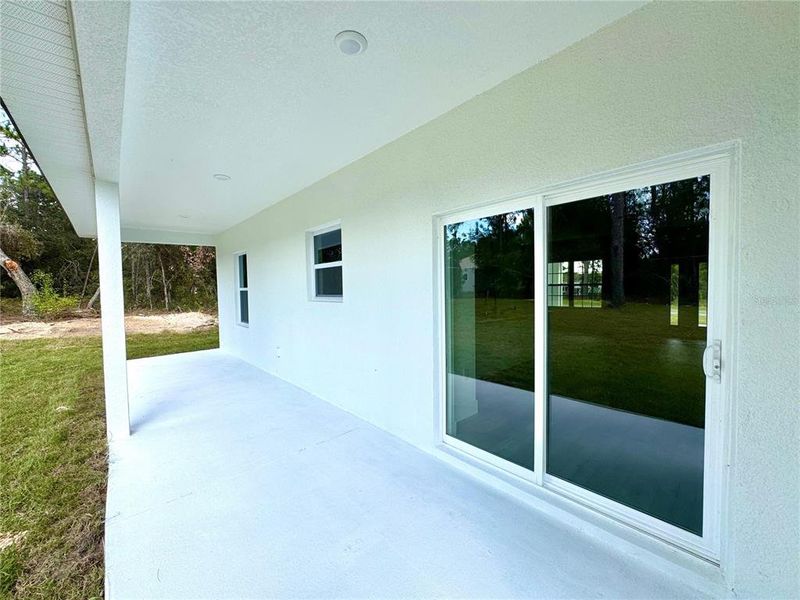 Exterior details and patio area of a home in , Citrus Springs (Image 14).