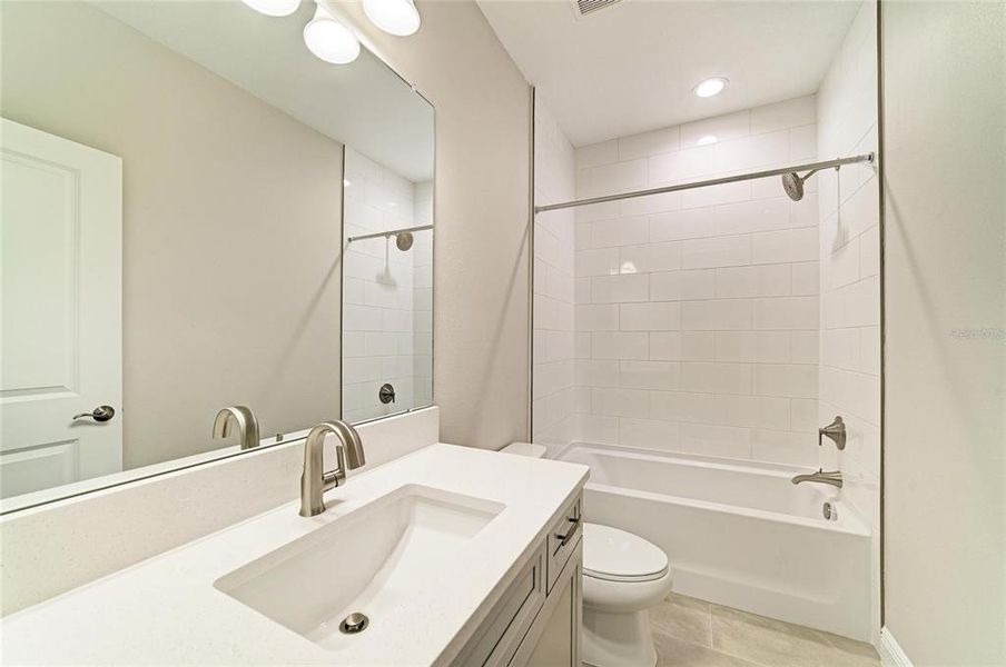 Furnished interior view inside a new home in Hidden Lakes, Brandon (Image 9).