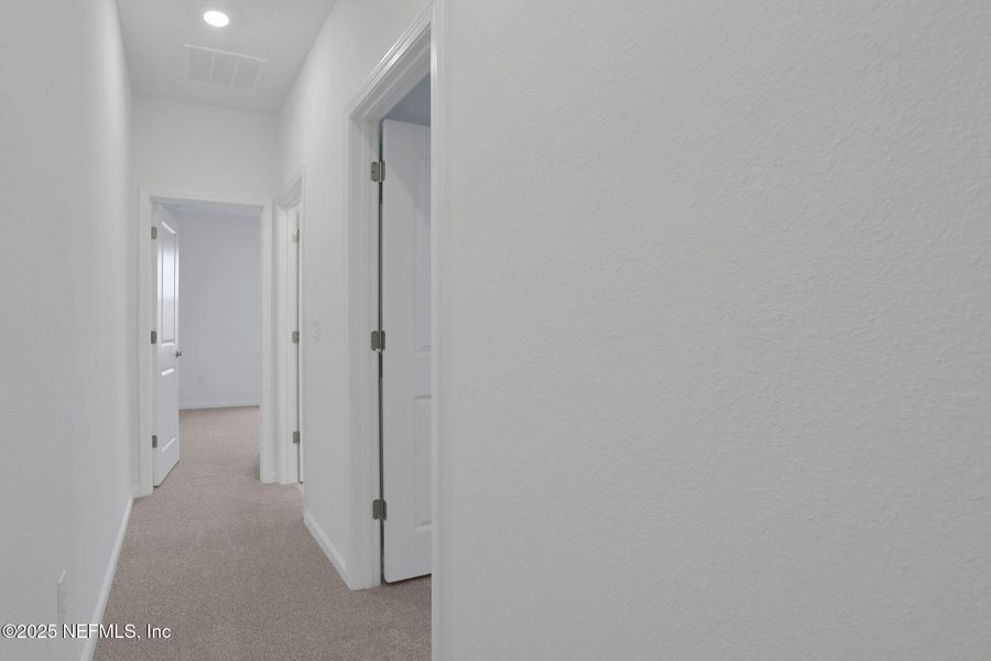 Spacious, unfurnished interior of a new home in Silver Landing at SilverLeaf, St. Augustine (Image 13).