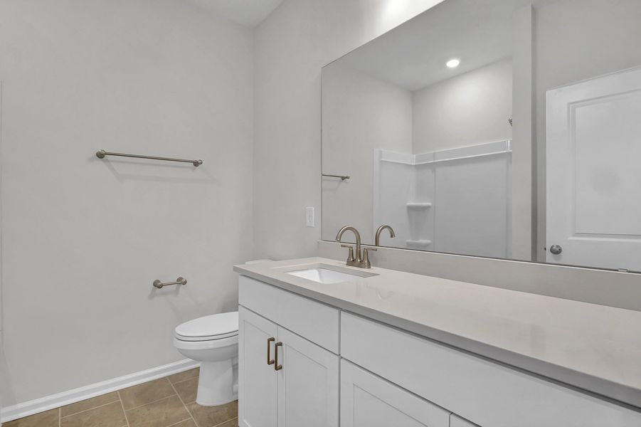 Furnished interior view inside a new home in Grand Park, Leland (Image 14).