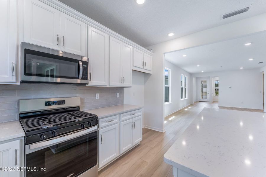 Furnished interior view inside a new home in Del Webb Wildlight, Yulee (Image 10).