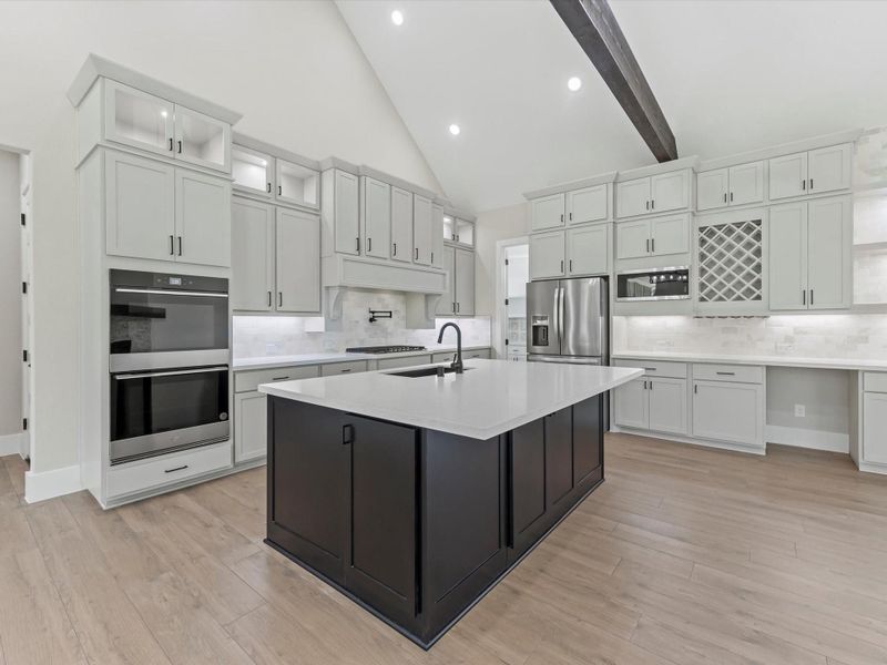 Large kitchen island great for entertaining. Large kitchen island great for entertaining.