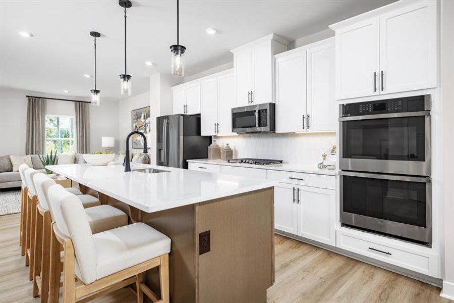 Representative furnished interior of a home built from the Schubert by Ryan Homes in Alexander Towns, Lawrenceville (Image 2).