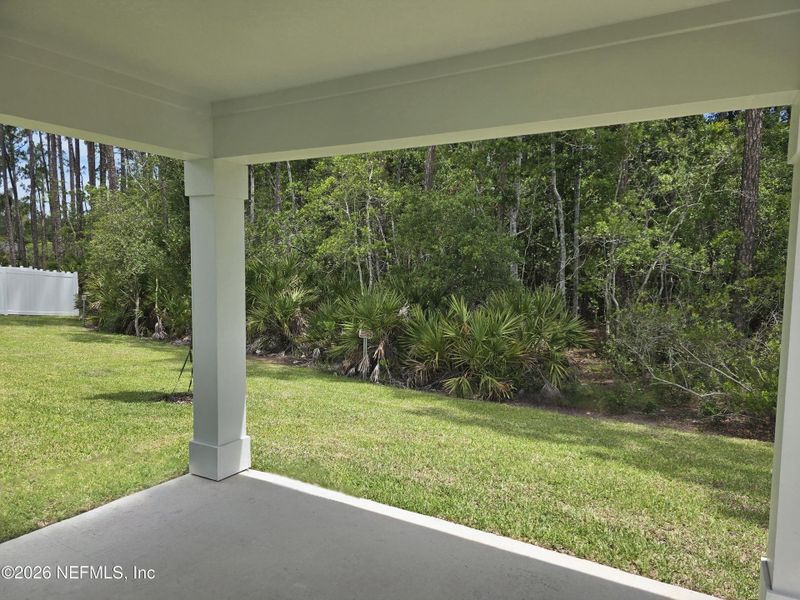 Exterior details and patio area of a home in Flagler Village - Signature Series, Palm Coast (Image 4).
