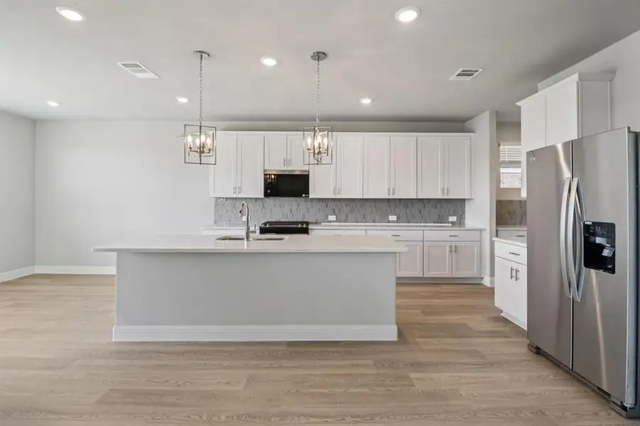 Photo is not of the actual home, but is an inspirational photo of builder’s model home and may depict options, furnishings, and/or decorator features that are not included.