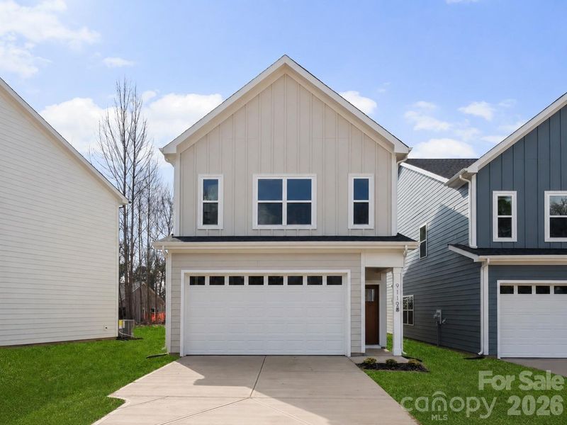 Front exterior of a new home in , Charlotte, NC, highlighting curb appeal (Image 27). Front exterior of a new home in , Charlotte, NC, highlighting curb appeal (Image 27).
