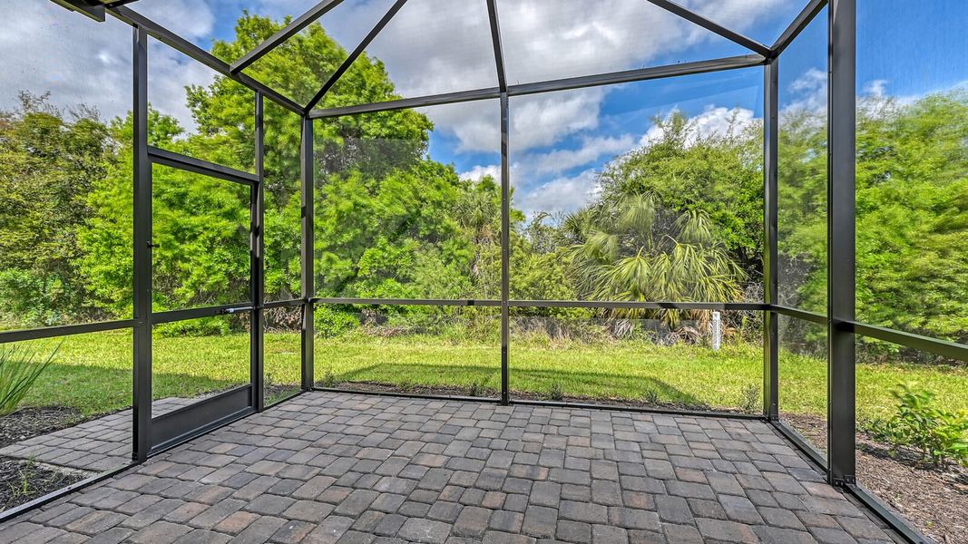 Exterior details and patio area of a home in Boca Royale Golf and Country Club at Wellen Park, Englewood (Image 23).