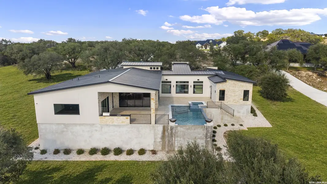 Exterior details and patio area of a home in , Canyon Lake (Image 38).