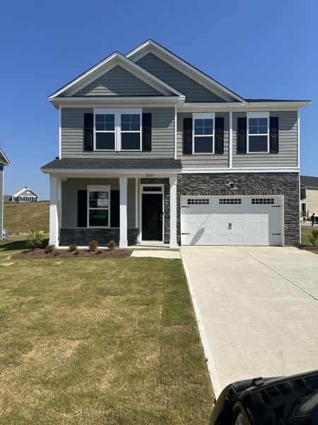 Exterior details and patio area of a home in Providence Station at Trolley Run, Aiken (Image 3). Exterior details and patio area of a home in Providence Station at Trolley Run, Aiken (Image 3).