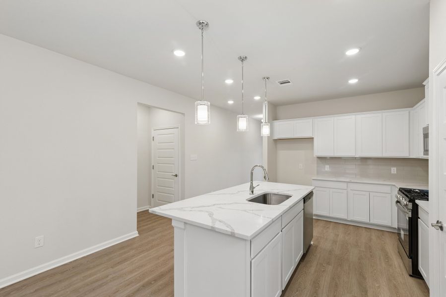 The Oakshire II- Kitchen Alternate Angle.  Sample image for illustration; upgrades, options, and colors may vary.