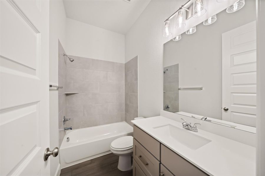 Furnished interior view inside a new home in The Woodlands Hills 60', Willis (Image 9). Furnished interior view inside a new home in The Woodlands Hills 60', Willis (Image 9).