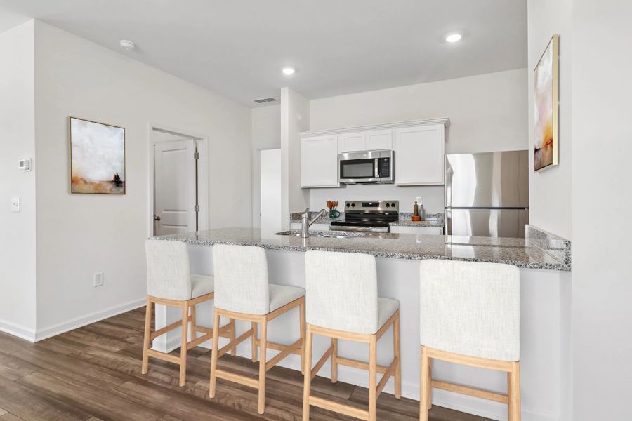 Representative furnished interior of a home built from the Larissa by Starlight Homes in Crescent Pointe, Carrollton (Image 4).