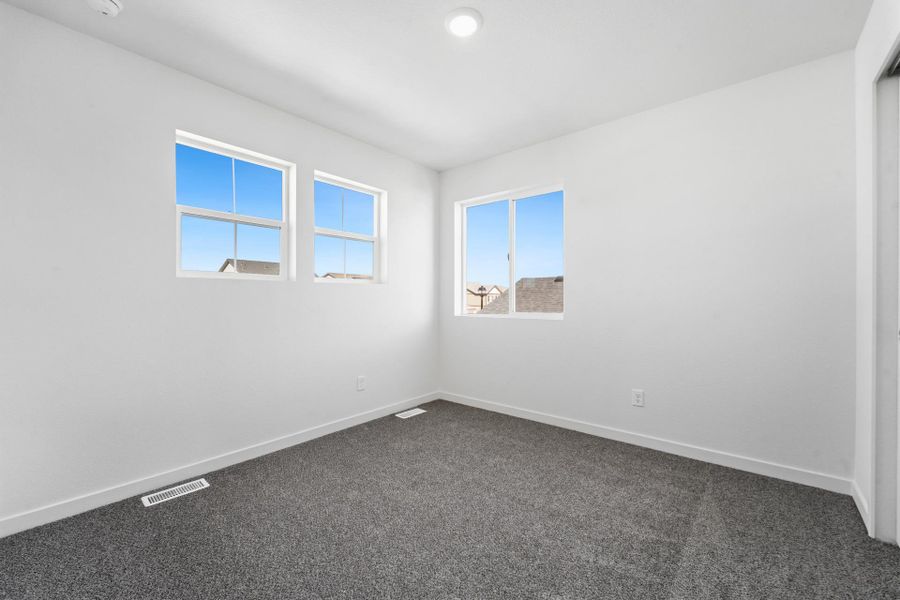 Spacious, unfurnished interior of a new home in Granary, Johnstown (Image 24).