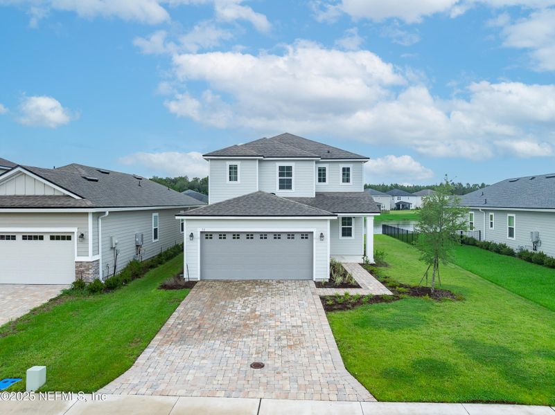 Front exterior of a new home in , St. Augustine, FL, highlighting curb appeal (Image 22).