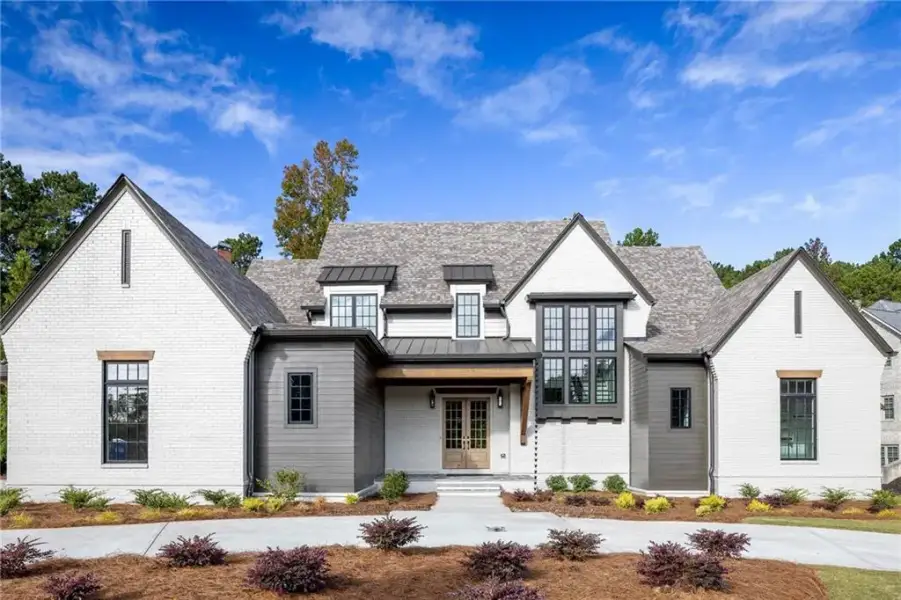 Front exterior of a new home in , Roswell, GA, highlighting curb appeal (Image 1). Front exterior of a new home in , Roswell, GA, highlighting curb appeal (Image 1).