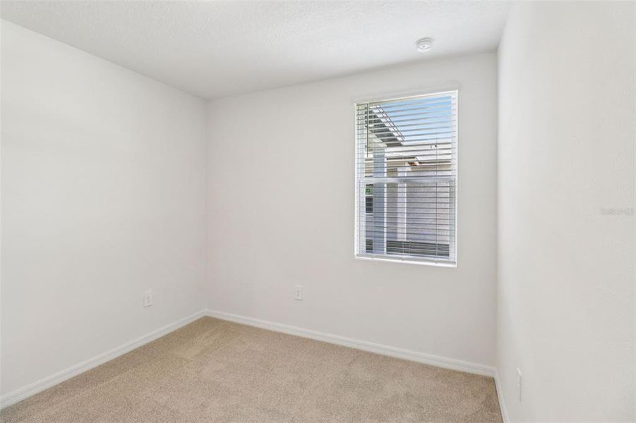 Spacious, unfurnished interior of a new home in Ridgehaven - Villas, Ormond Beach (Image 24).