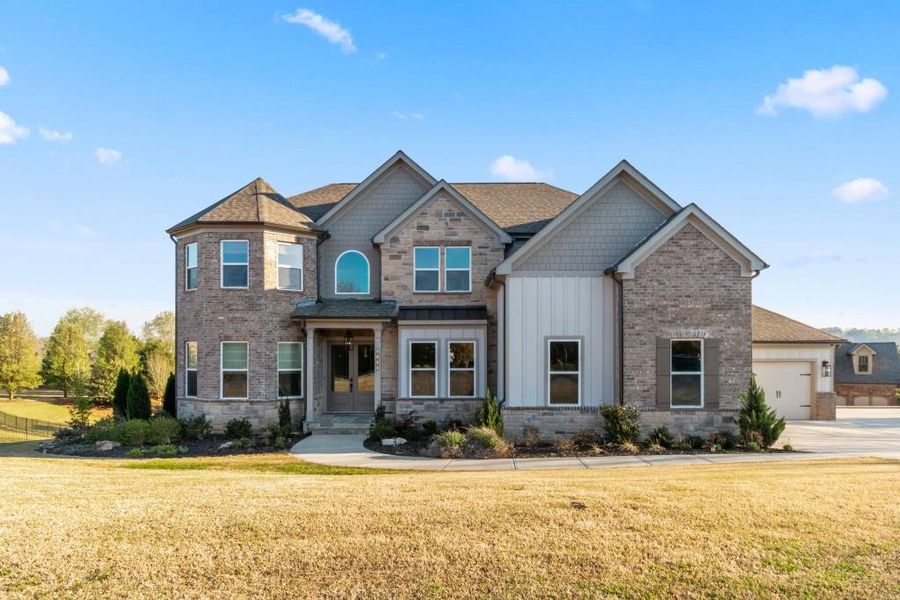 Front exterior of a new home in , Flowery Branch, GA, highlighting curb appeal (Image 28).