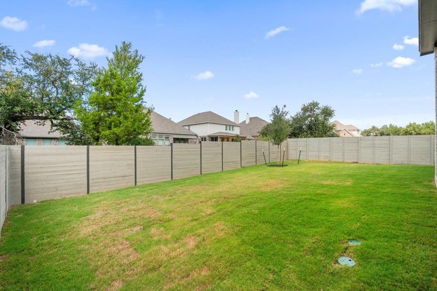 Exterior details and patio area of a home in Wolf Ranch, Georgetown (Image 23).