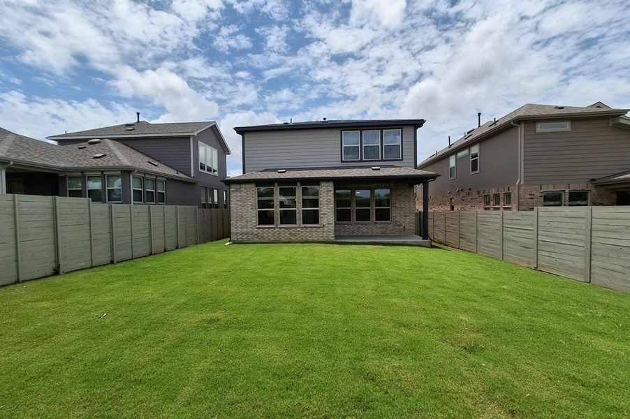 Exterior details and patio area of a home in Wolf Ranch, Georgetown (Image 19).