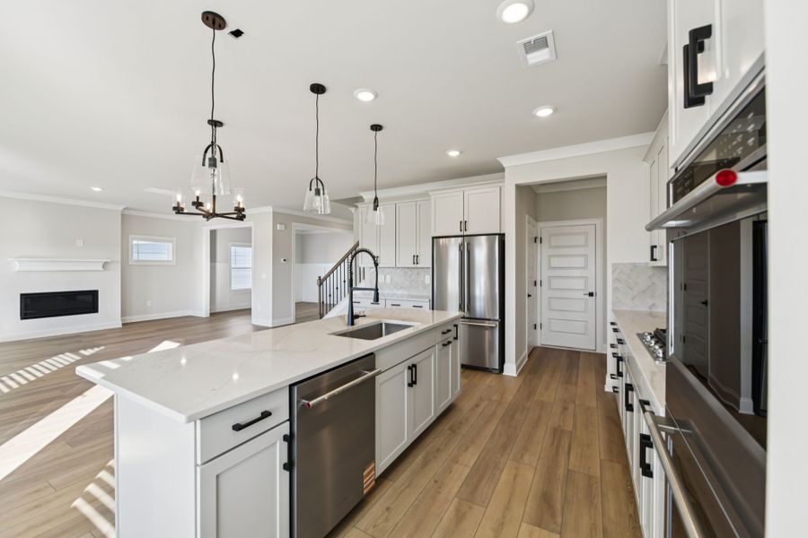 Furnished interior view inside a new home in Vines at Mill Creek - Legacy Series, Braselton (Image 5). Furnished interior view inside a new home in Vines at Mill Creek - Legacy Series, Braselton (Image 5).