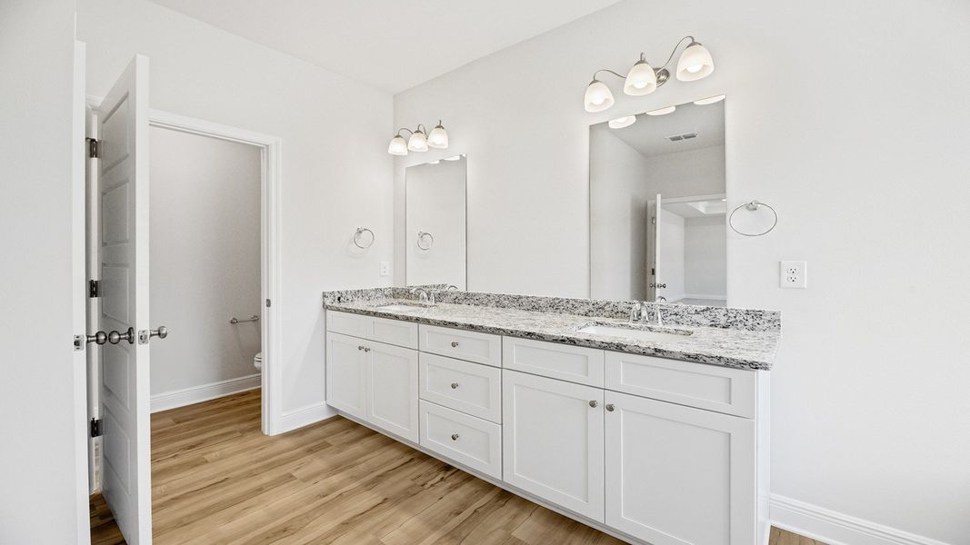 Representative furnished interior of a home built from the The Hawthorne by D.R. Horton in Meadows at Rehwinkel, Crawfordville (Image 26).