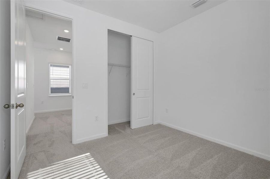 Spacious, unfurnished interior of a new home in Serenade at Ovation, Winter Garden (Image 23).