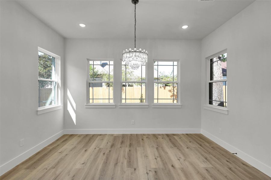 Dining area conveniently located off the kitchen, perfect for hosting guests Dining area conveniently located off the kitchen, perfect for hosting guests