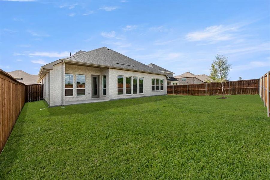 Exterior details and patio area of a home in Milrany Ranch, Melissa (Image 4).