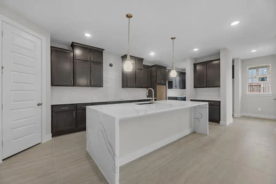 Furnished interior view inside a new home in Wolf Ranch, Georgetown (Image 4).