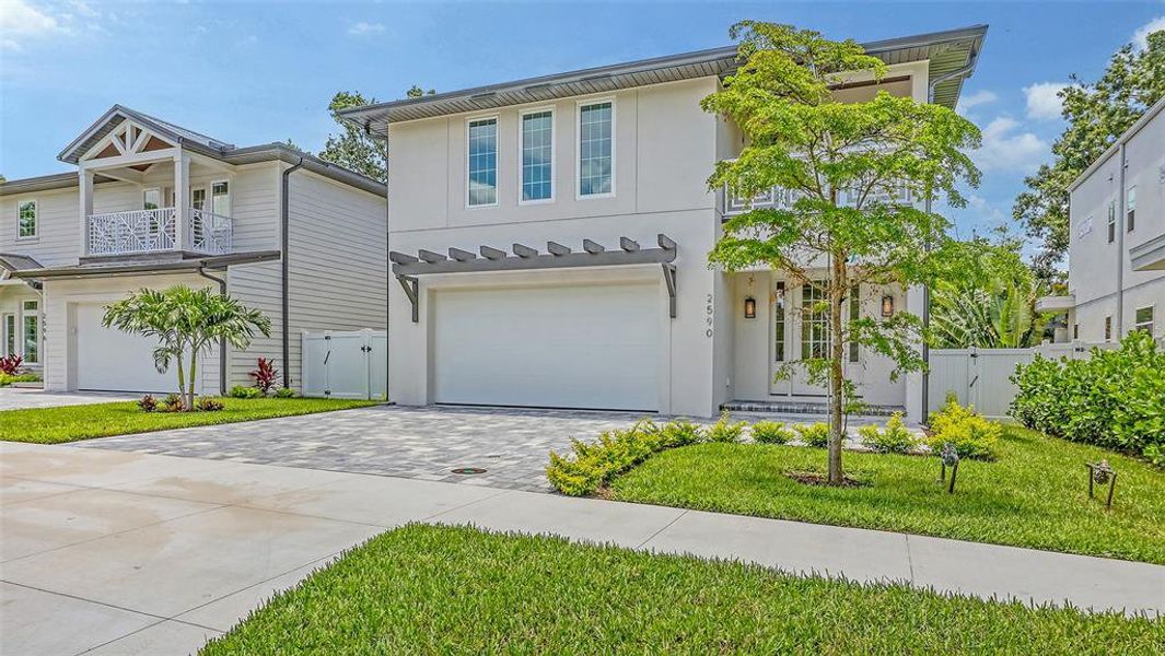 Front exterior of a new home in , Sarasota, FL, highlighting curb appeal (Image 24). Front exterior of a new home in , Sarasota, FL, highlighting curb appeal (Image 24).