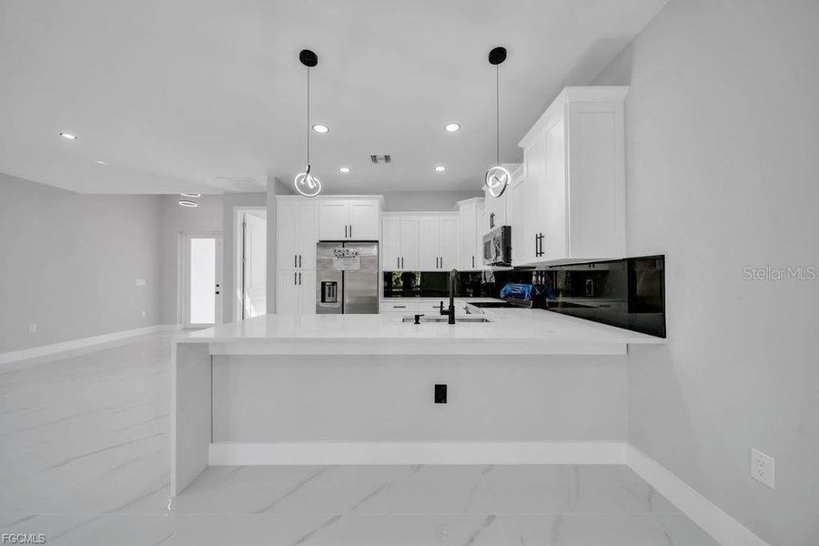 Furnished interior view inside a new home in , Lehigh Acres (Image 11).