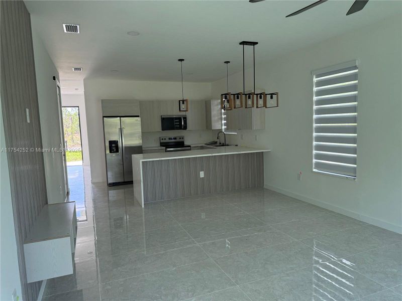 Furnished interior view inside a new home in , Punta Gorda (Image 12).