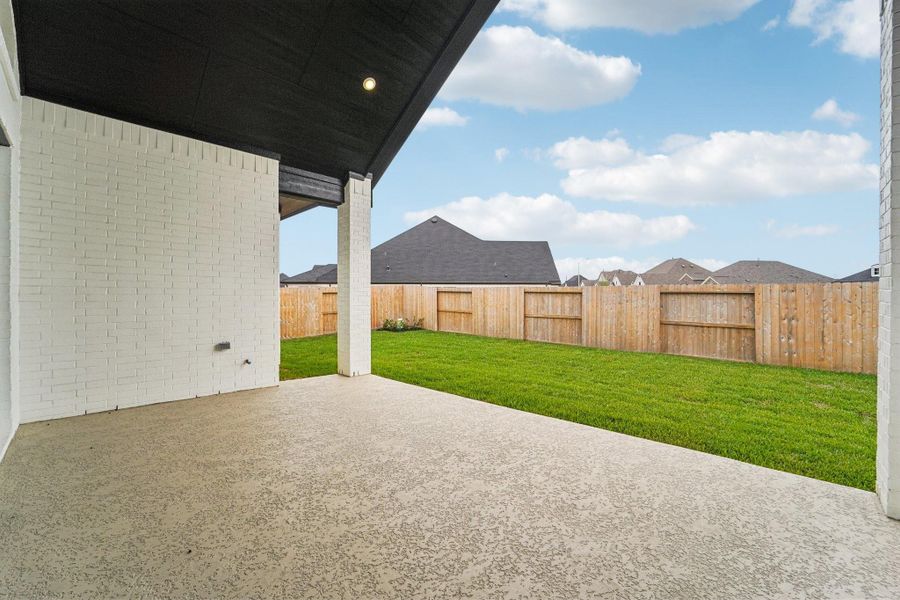 Exterior details and patio area of a home in Sienna 65', Missouri City (Image 24).