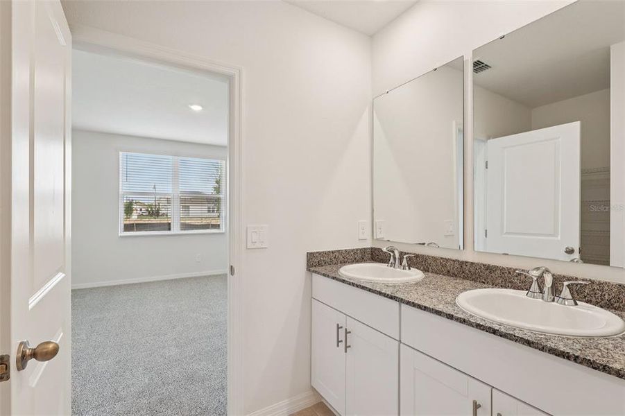 Furnished interior view inside a new home in Crosswinds - Signature Series, Haines City (Image 13).