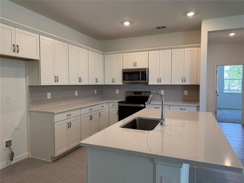 Furnished interior view inside a new home in Southpointe, Palmetto (Image 11).