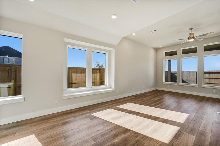 Spacious, unfurnished interior of a new home in Sunterra, Katy (Image 30).